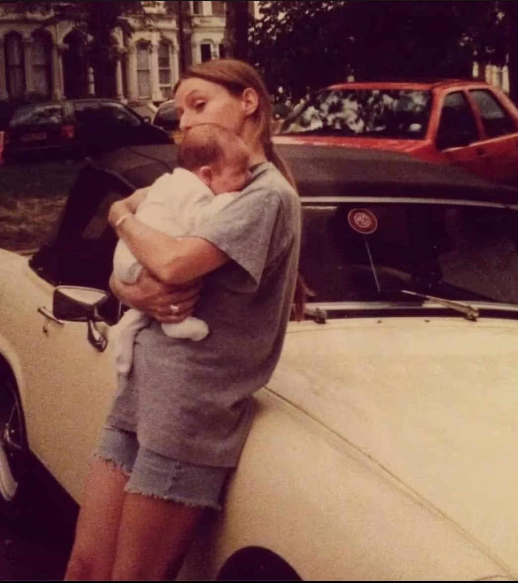 Marley's mum holding her when she was a baby