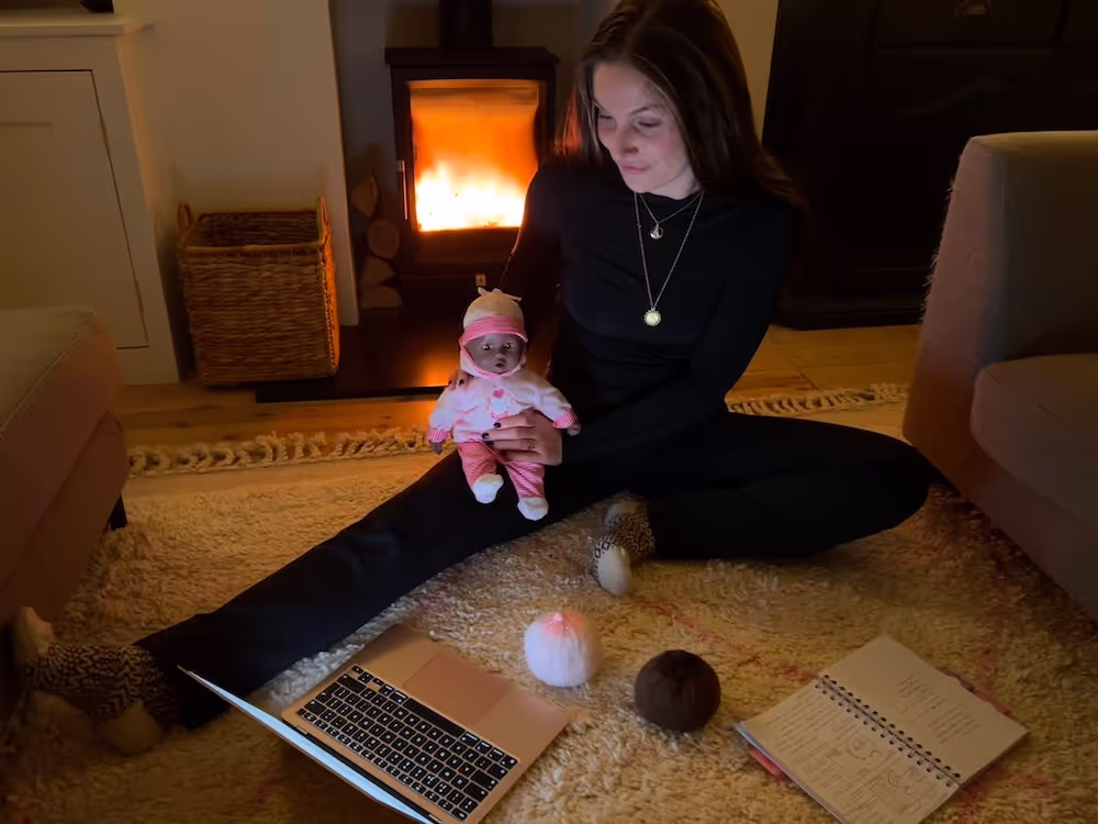 Marley holding a baby