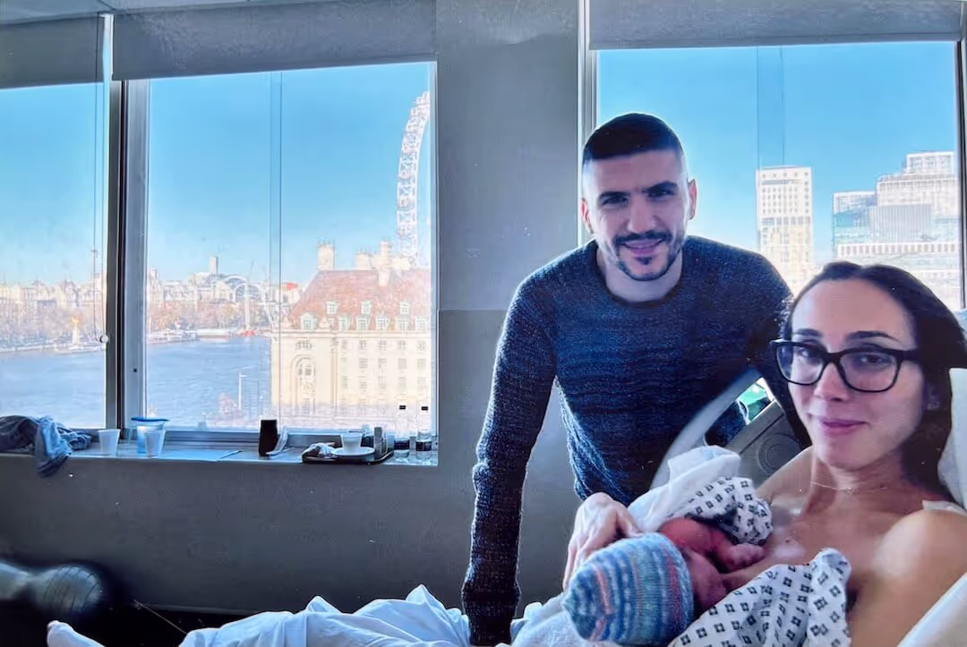 A couple with their new baby